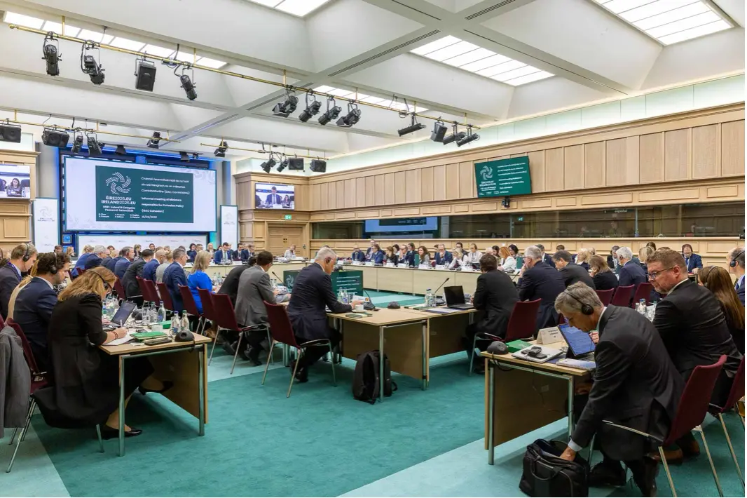 Meeting participants seated in a conference room
